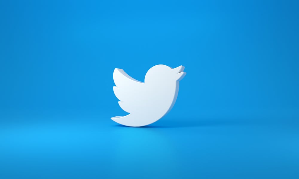 Twitter Logo with Space for Text and Graphics. Blue Background.